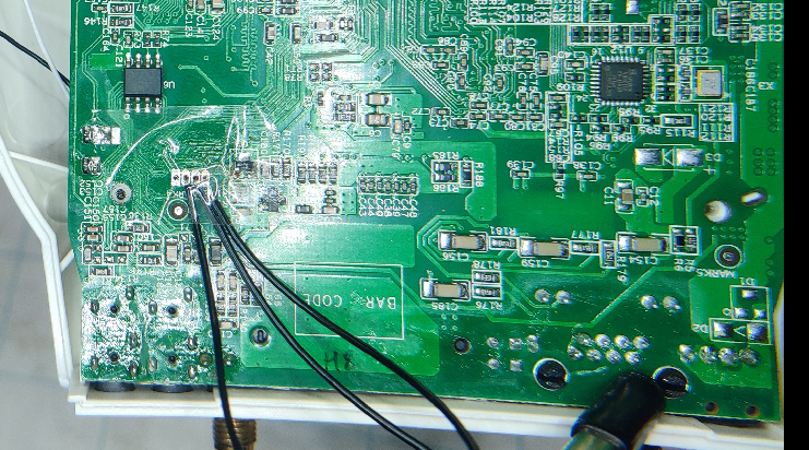 Photograph of the FI9831W with UART pins attached